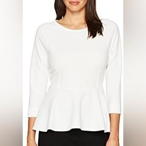 White peplum top